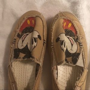 Slip on Mickey Mouse crocs.